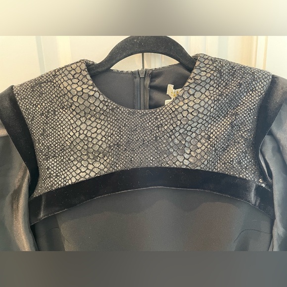 Shanis black long sleeve knee length dress. Poof detail at cuff. - Picture 4 of 6